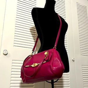 Magenta Coach crossbody bag